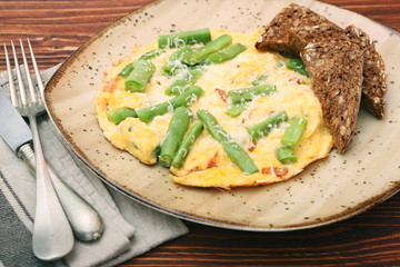 Scrambled eggs with green beans and toast, healthy and nutrition
