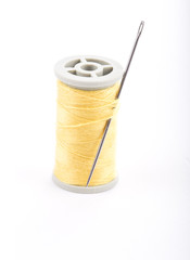 Colored sewing thread white background