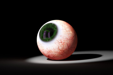 realistic human eyeball with green iris looking into a spotlight