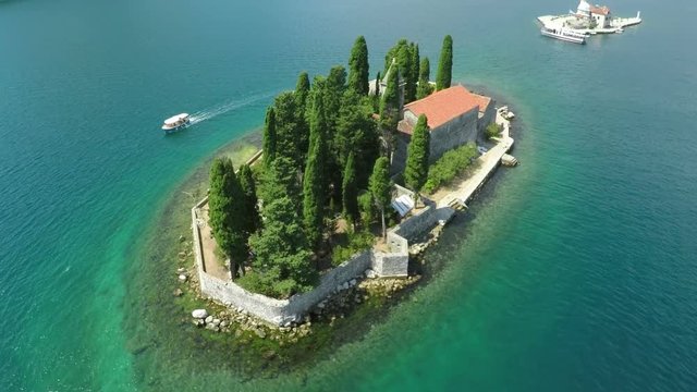 Aerial view of St. George island and old artificial island Gospa od Skrpjela in Perast, Bay of Kotor, Montenegro