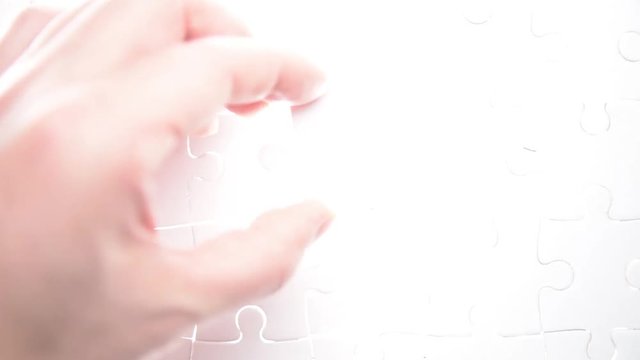  jigsaw puzzle piece with light glow, business concept for completing the final puzzle piece.