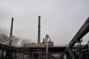Fototapeta na wymiar Industrial area with pipes and chimney in Beijing China