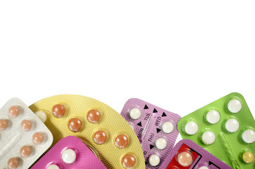 Oral contraceptive pill strips isolated on white background.