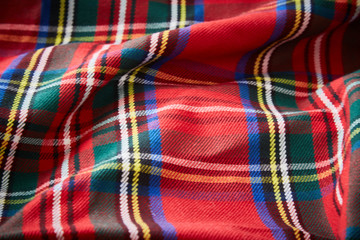 red scottish kilt textile detail