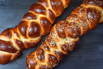 tasty challah on a wooden background
