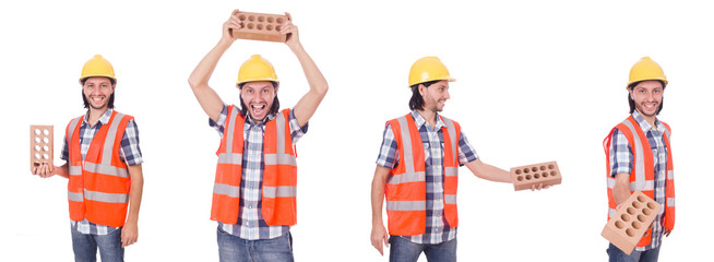 Young bricklayer with brick isolated on white