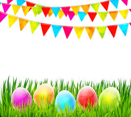 Happy Easter greeting card with colorful glass eggs on green grass