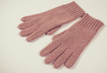 Winter, woolen gloves on a white background.