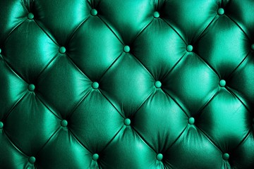 Saturated glossy turquorise leather texture of sofa chair