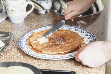 Fried pancake smear with butter