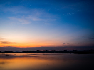 Fototapeta na wymiar Sunset Reflection In Lake