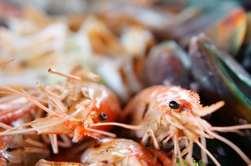 seafood grilled shrimp and mussel with squid or octopus for delicious lunch or dinner and have iodine with cholesterol at restaurant with space