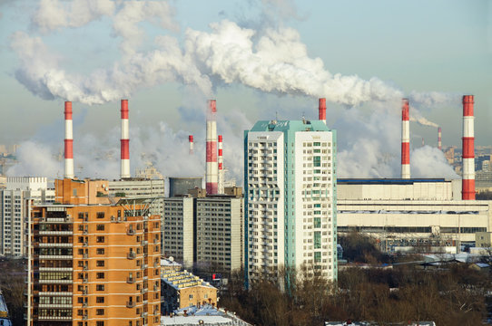 Panoramic view of the Akademichesky district in winter with the smoking chimneys of the combined heat and power plant. Moscow, Russia