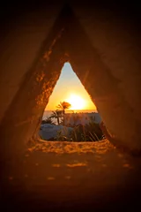 Peel and stick wall murals Middle East View of the sunset through a triangular hole in Sharm-el-Sheikh, Egypt
