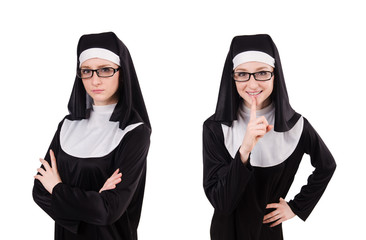 Young serious nun isolated on white