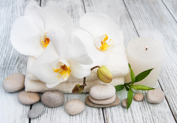 Naklejka na ściany i meble Spa products and white orchids