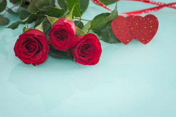 occasional beautiful red roses with decorative hearts and a place for dedications or wishes