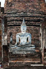 Buddha Statue at the Wat Sa-Si Temple in the Historic Park of Sukhothai, Thailand.