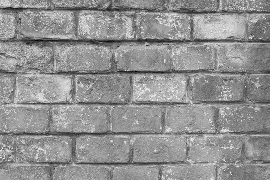 Fototapeta Very old grey brick wall as background or wallpaper. Brick texture and pattern