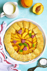 Delicious summer dessert peach galette.Top view.