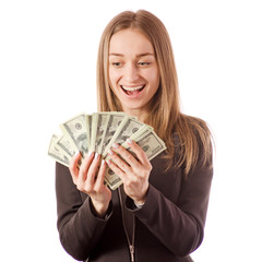 Beautiful young woman in the hands of money dollars
