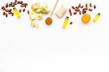 Cocoa butter for skin care. White background top view copy space