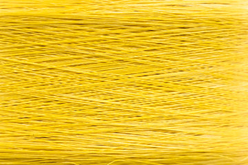 Closed up of yellow thread textured background