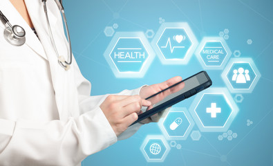 Female doctor with tablet