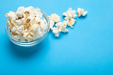 Glass bowl with popcorn, copy space.