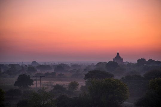 Beautiful landscape view of sunset Pagoda in Bagan city, Myanmar. Landmark and famous of romantic place of travel
