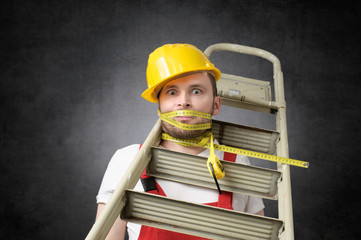 Clumsy worker with measure tape