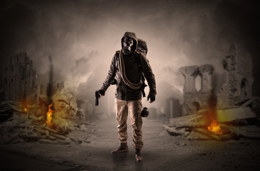 After catastrophe men coming in gas mask and arms