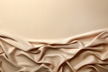 Background of beige satin fabric