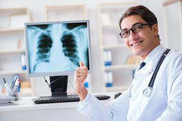 Doctor radiologist looking at x-ray images