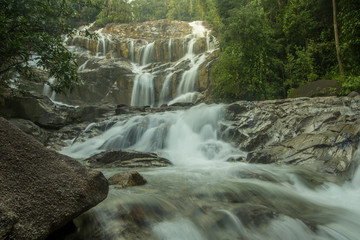 The scenery in the waterfall area in the tropical rainforest in Kuantan, Pahang, Malaysia.visible water secretion and noise
