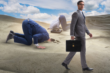 Businessman hiding his head in sand escaping from problems - Powered by Adobe