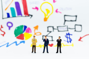 Miniature people : Businessman think of a new solution to business, create idea. Image use for business concept.