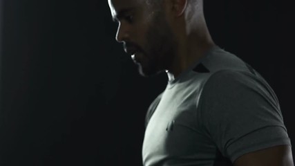 Latin sportsman training strength, exercising with skipping rope in gym, workout