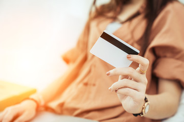 Young asian girl is freelancer with her private business at home office, working with laptop, coffee, online marketing. Young woman startup her SME business.