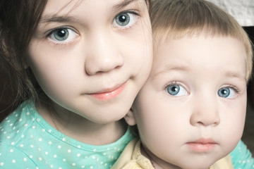 Portrait of two beautiful girls sisters