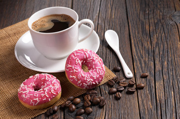Pink donuts and coffee