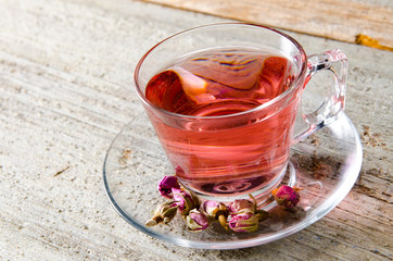 Fruit berry tea in the cup served on table