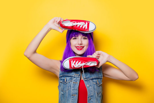hipster girl with purple hair and red gumshoes