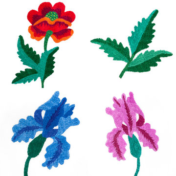 Embroidery pattern of flowers handmade smooth thread of floss on white background isolate with copy space flat view from above