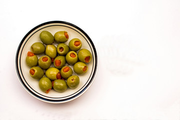 Closeup of a Bowl of Green Stuffed Olives