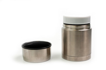 Lightweight, metallic thermos for eating with a plastic plate on a white background