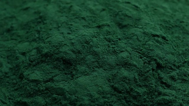 Spirulina Algae Powder, close up.Macro, selective focus
