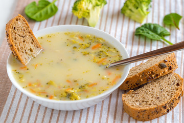 Vegetarian soup with broccoli and vegetables.