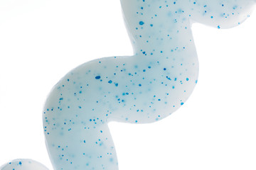 Toothpaste. View from the bottom. On white background