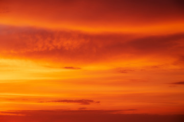 Beautiful fiery orange sunset sky as background